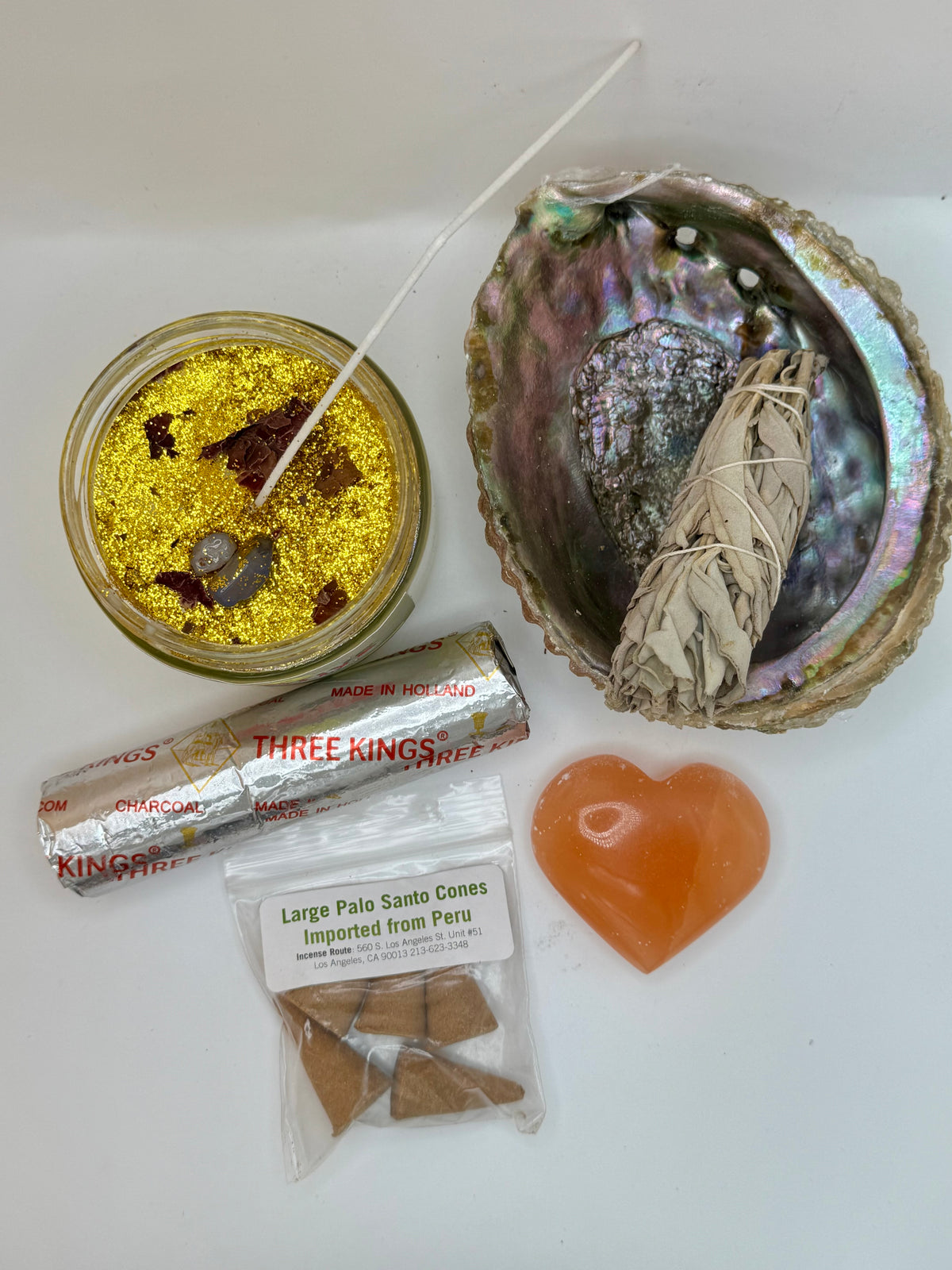 Housewarming Bundle with selenite heart, white sage, abalone shell, candle, Palo Santo cones, and charcoal - Incense Route